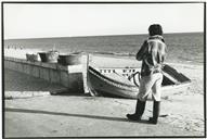 Preparação de aprestos para pesca do aparelho no paredão da praia de Sesimbra